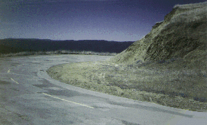 Road, sky, cliffside