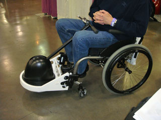 Photo of RoWheel on a manual wheelchair