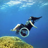 photo of wheelchair user underwater