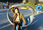 Lynee spins at the Magical Bridge Playground 