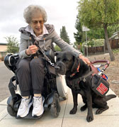 photo of Nathan & Abby in her Whill wheelchair