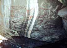 Other Cuchimachay rock art, in this case one of the largest panels.  Adult male and females seem to be represented, as well as young