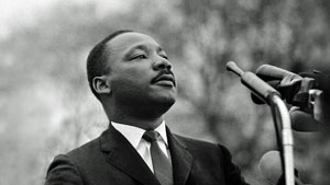 Photo of MLK at the microphone